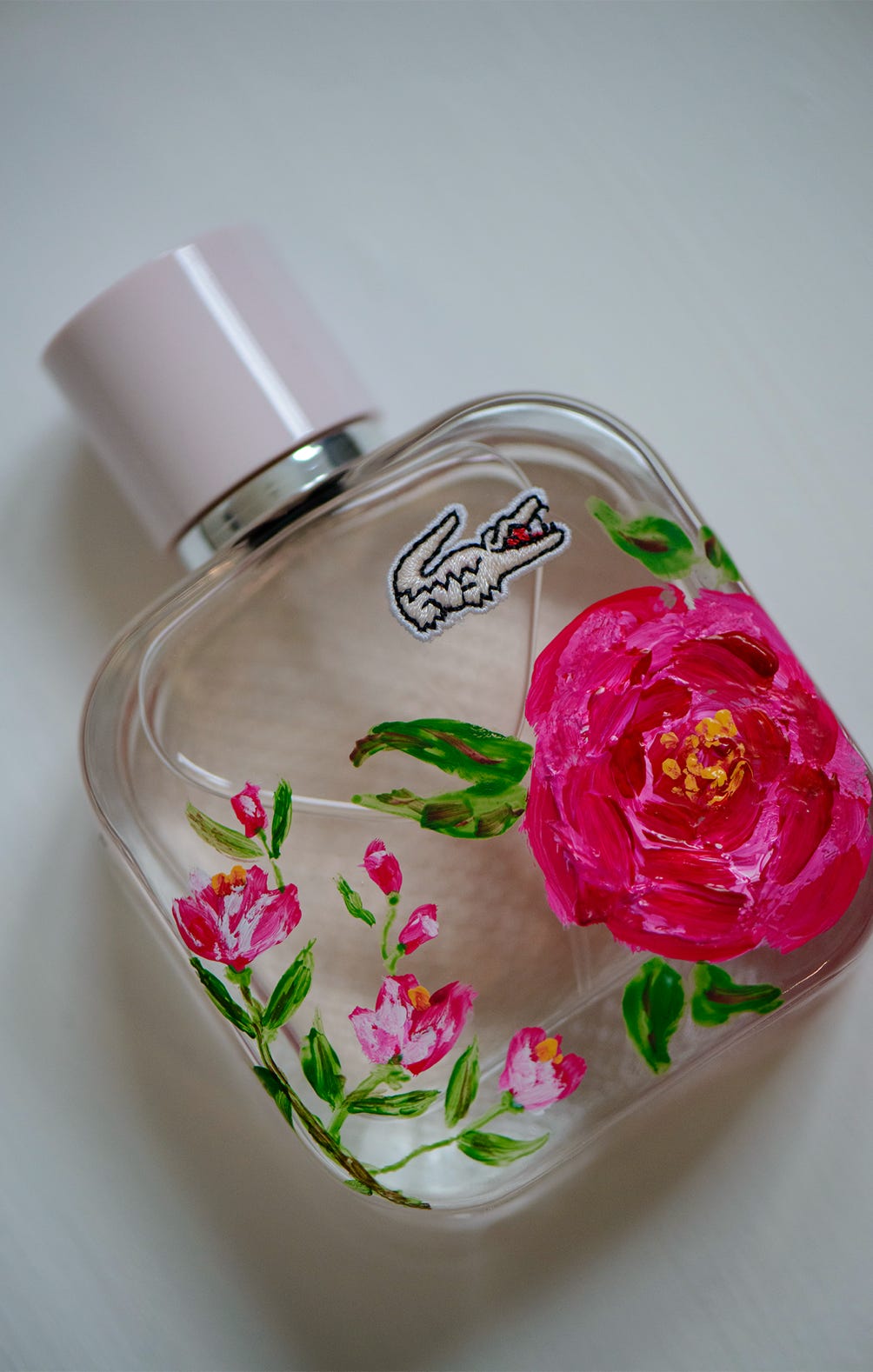 Malerei auf Glasflaschen, live event Malerei auf parfüm flaschen von Lacoste